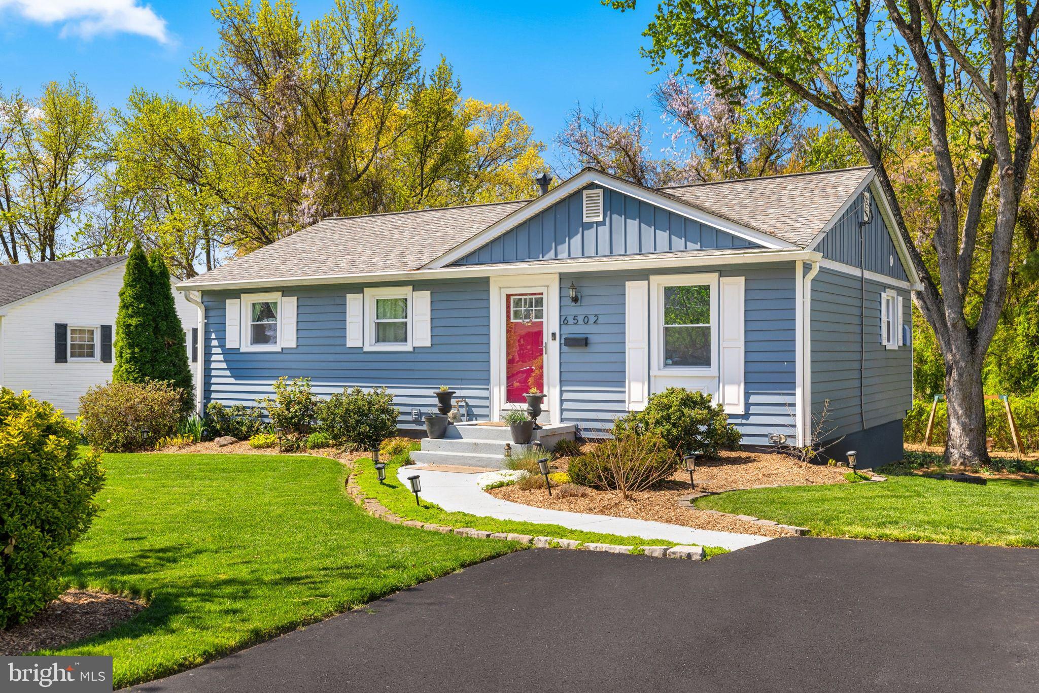 6502 Haystack Road Alexandria, VA 22310 - Photo 2 of 30 a front view of house with yard and green space