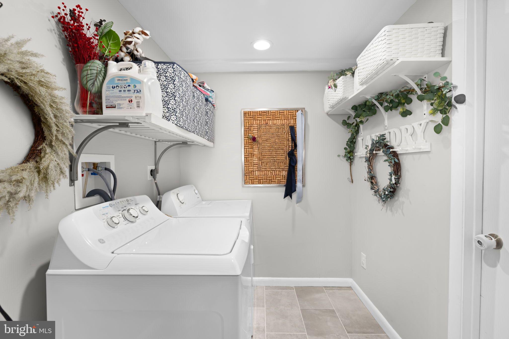 6502 Haystack Road Alexandria, VA 22310 - Photo 22 of 30 a bathroom with a sink mirror and vanity