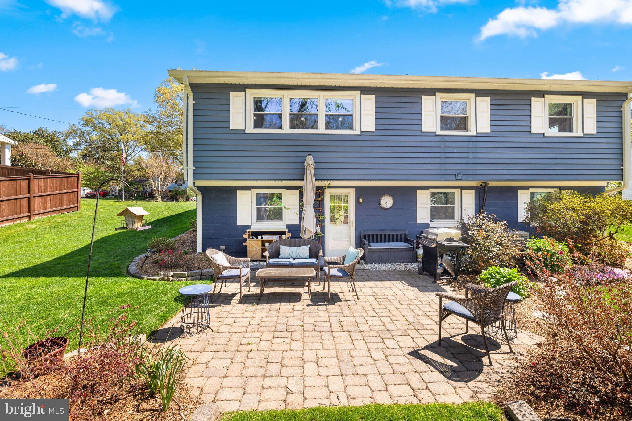 6502 Haystack Road Alexandria, VA 22310 - Photo 24 of 30 a view of a house with backyard sitting area and garden