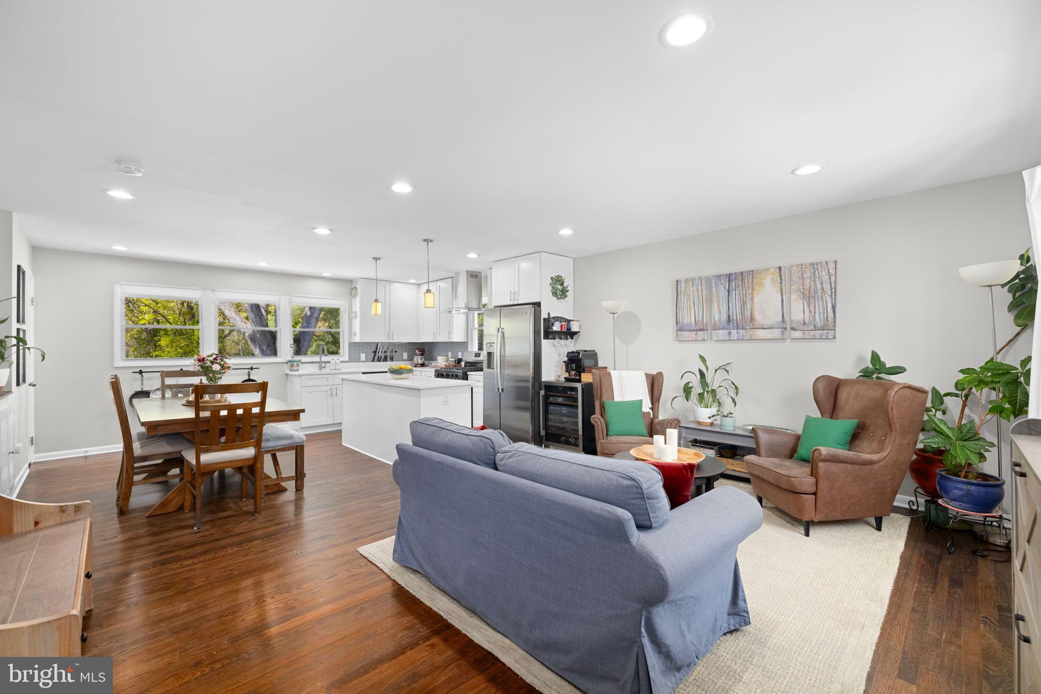 6502 Haystack Road Alexandria, VA 22310 - Photo 5 of 30 a living room with furniture kitchen view and a wooden floor