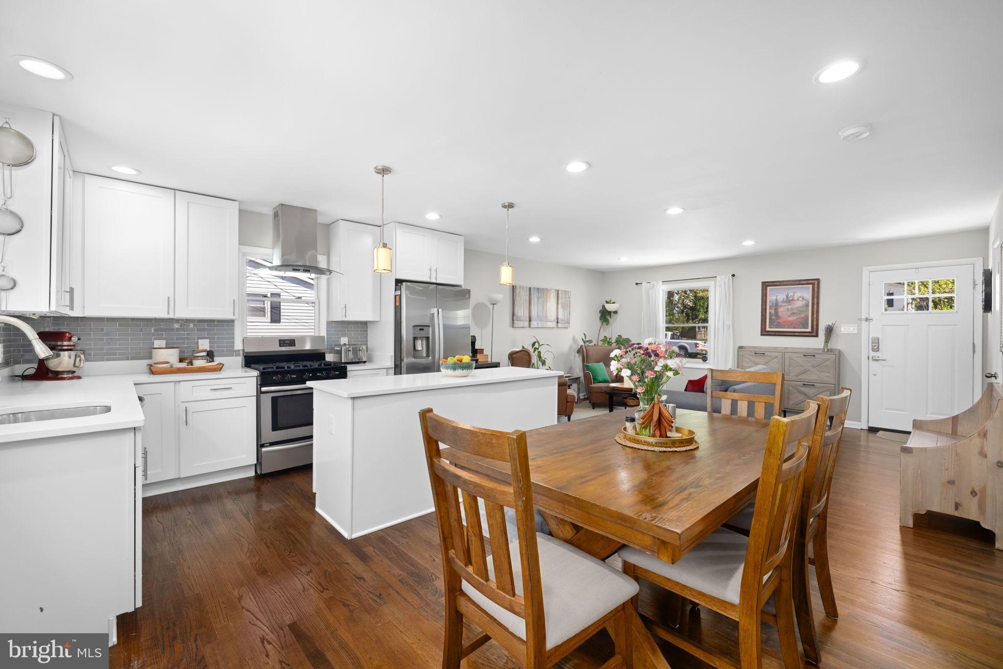 6502 Haystack Road Alexandria, VA 22310 - Photo 10 of 30 a view of kitchen with cabinets table and chairs