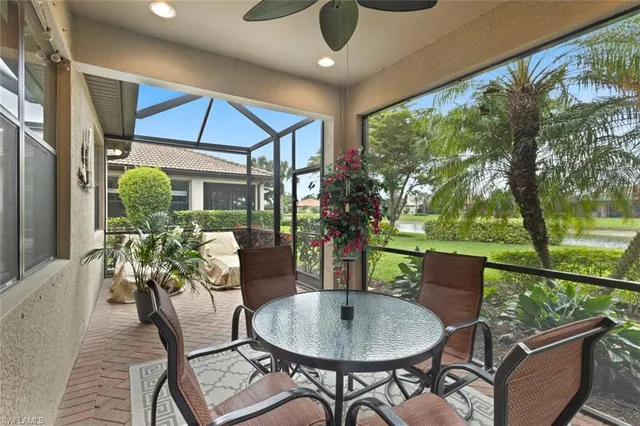 a dining room with furniture garden view and a potted plant
