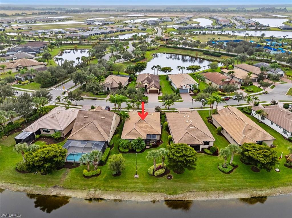 6085 Triumph Lane Ave Maria, FL 34142 - Photo 30 of 42 an aerial view of multiple house