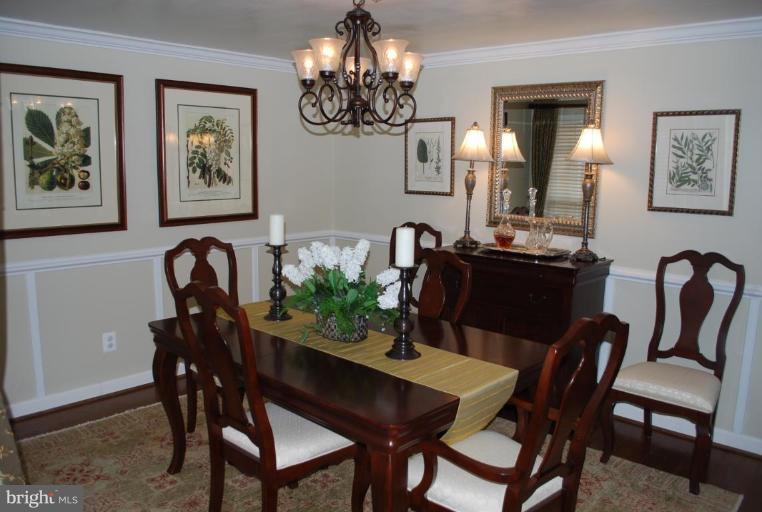 1532 Deer Point Way Reston, VA 20194 - Photo 2 of 19 a view of a dining room with furniture and chandelier