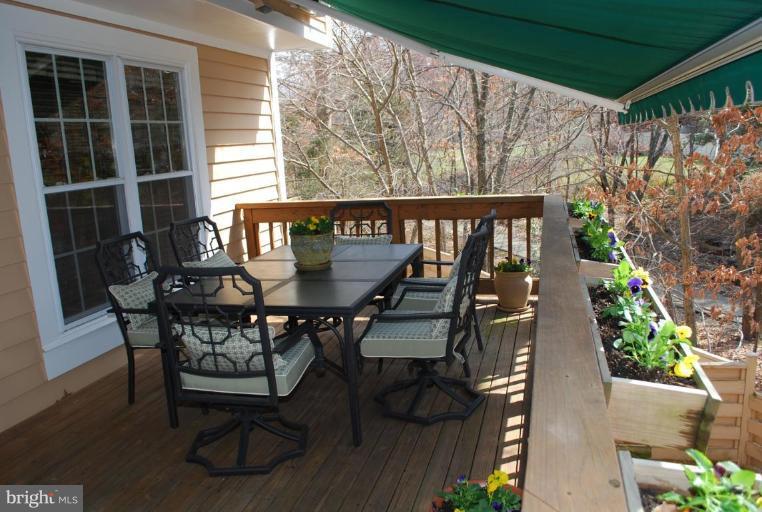 1532 Deer Point Way Reston, VA 20194 - Photo 17 of 19 a view of balcony with furniture and garden
