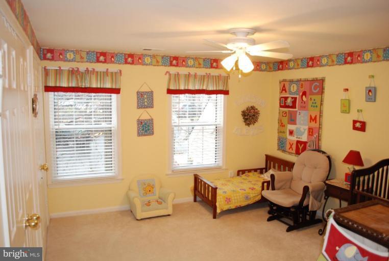 1532 Deer Point Way Reston, VA 20194 - Photo 9 of 19 a bedroom with furniture and a window