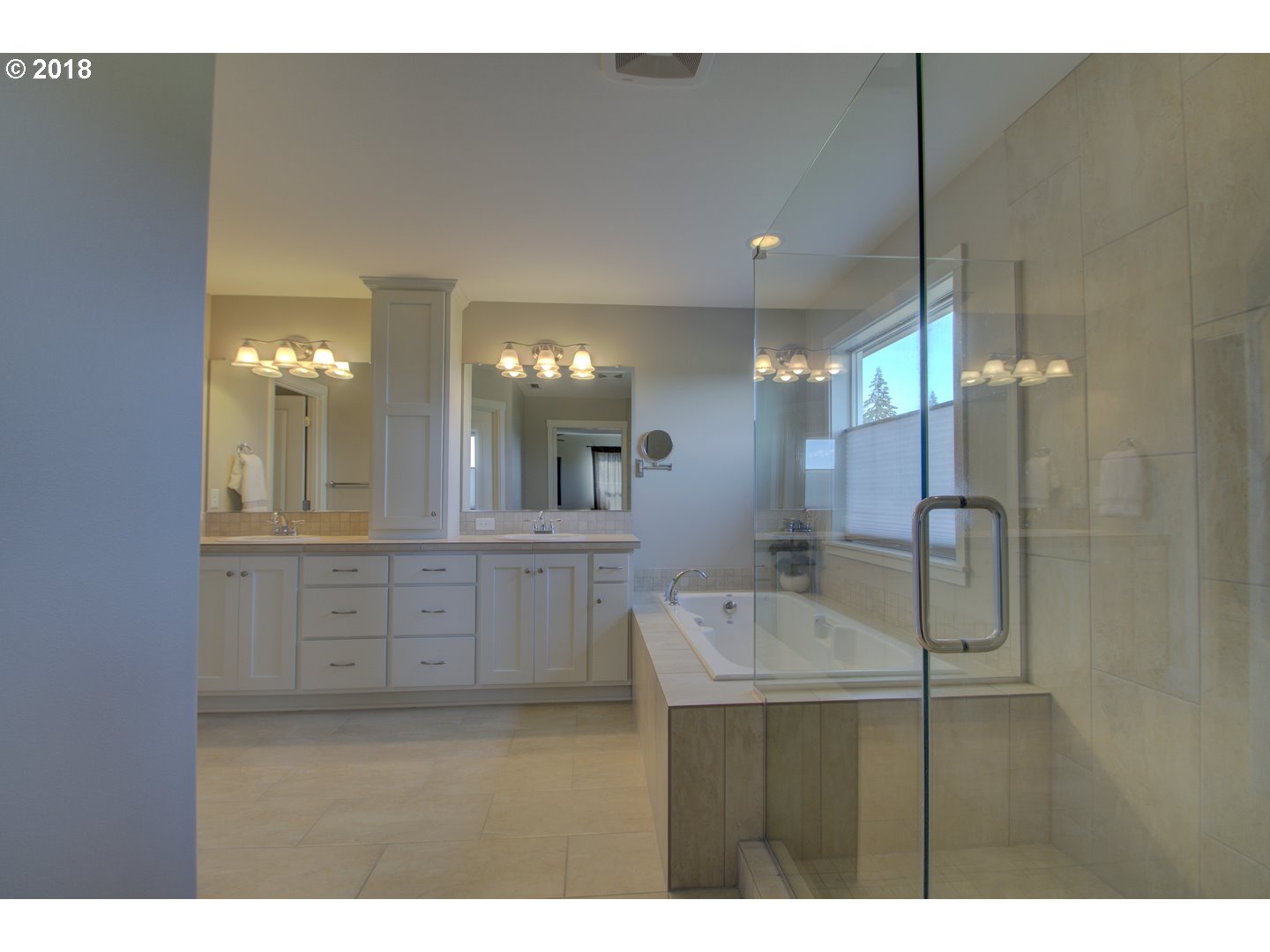 4821 North 6th Street Ridgefield, WA 98642 - Photo 20 of 29 a bathroom with a sink mirror and a shower
