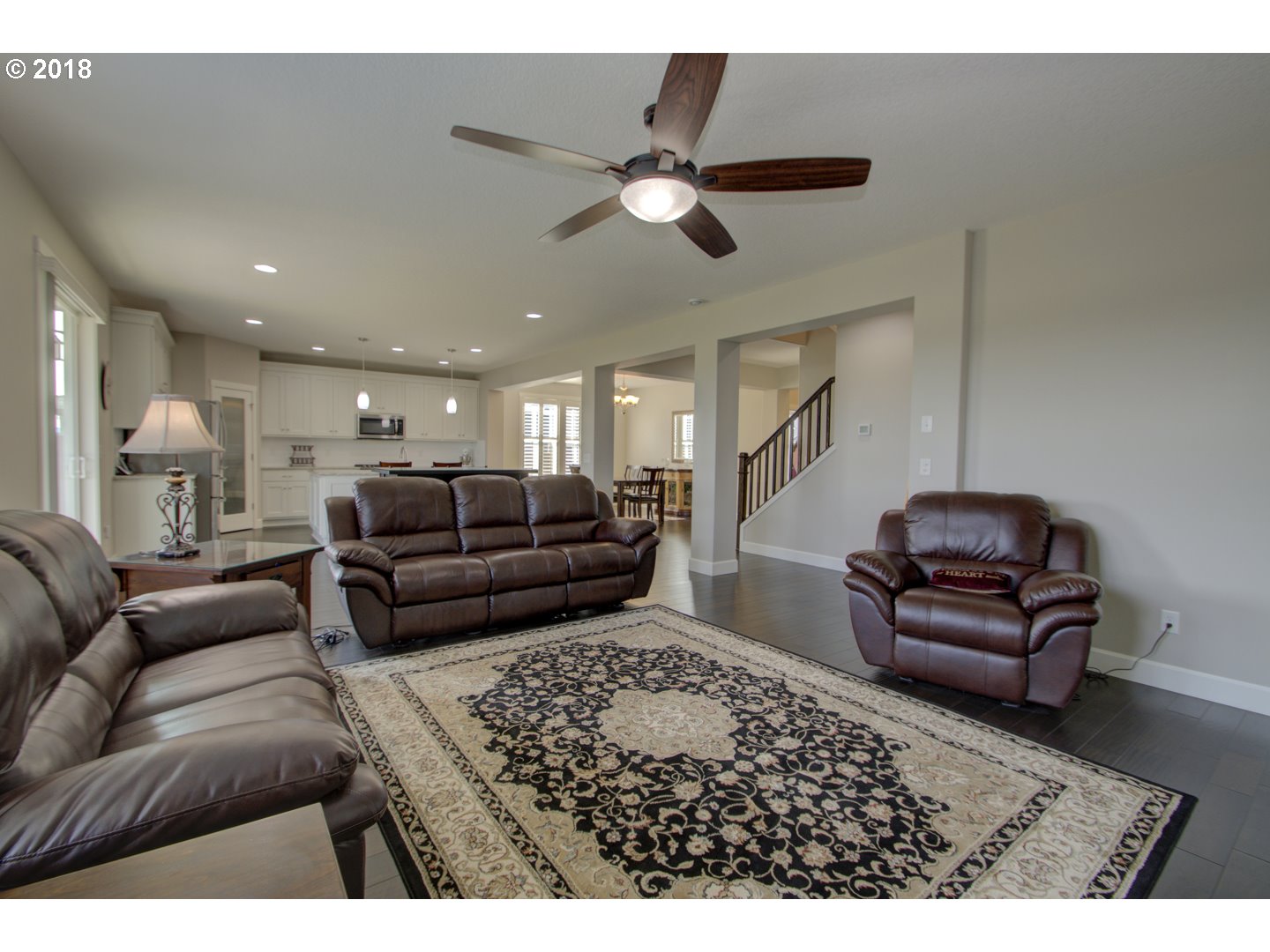 4821 North 6th Street Ridgefield, WA 98642 - Photo 6 of 29 a living room with furniture and a rug