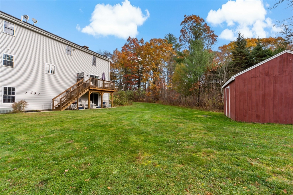 19 Cedar Street Rehoboth, MA 02769 - Photo 35 of 37 a view of a back yard of the house