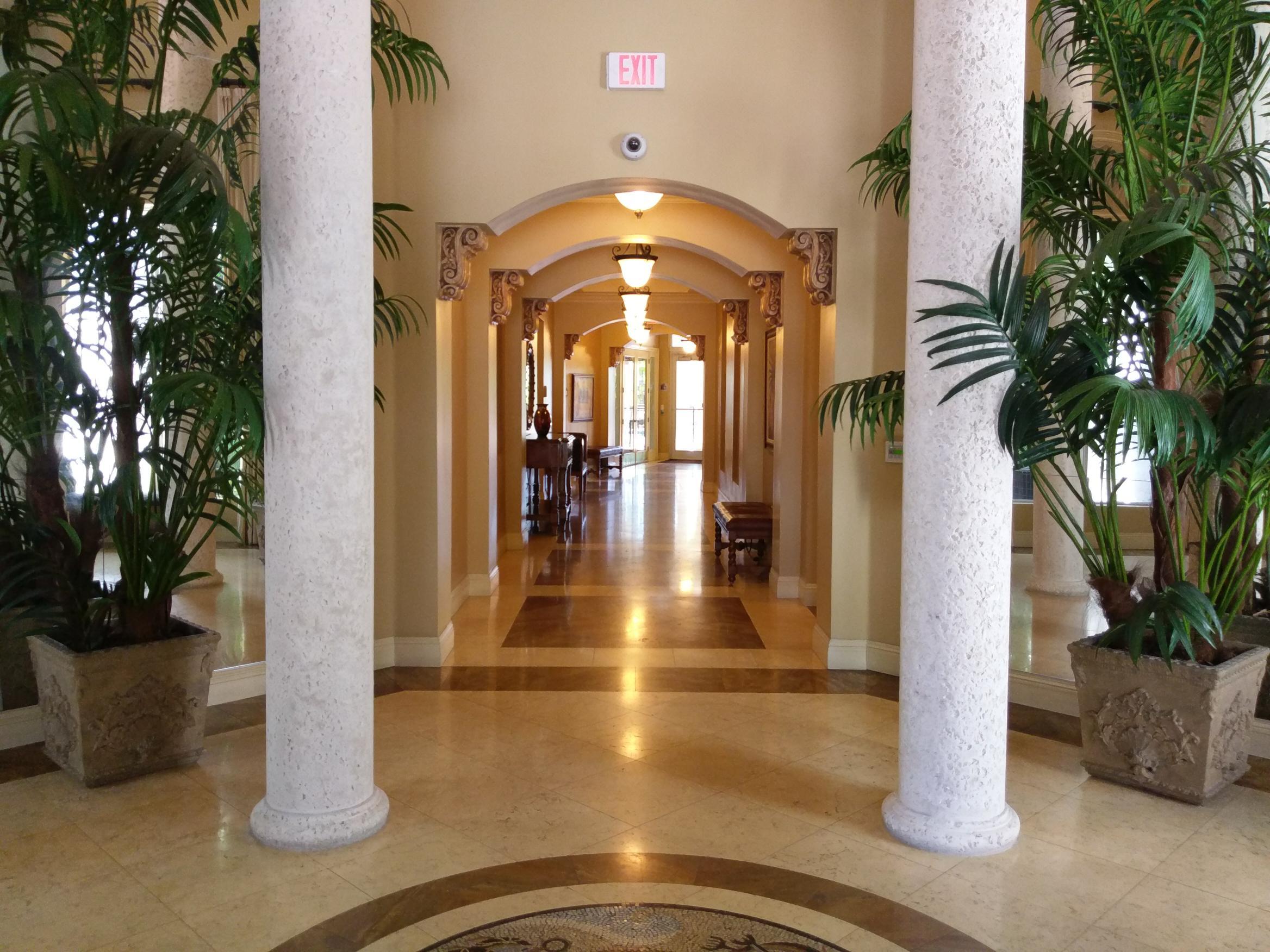 1690 Renaissance Commons Boulevard, Unit 1315 Boynton Beach, FL 33426 - Photo 20 of 39 Clubhouse - hallway
