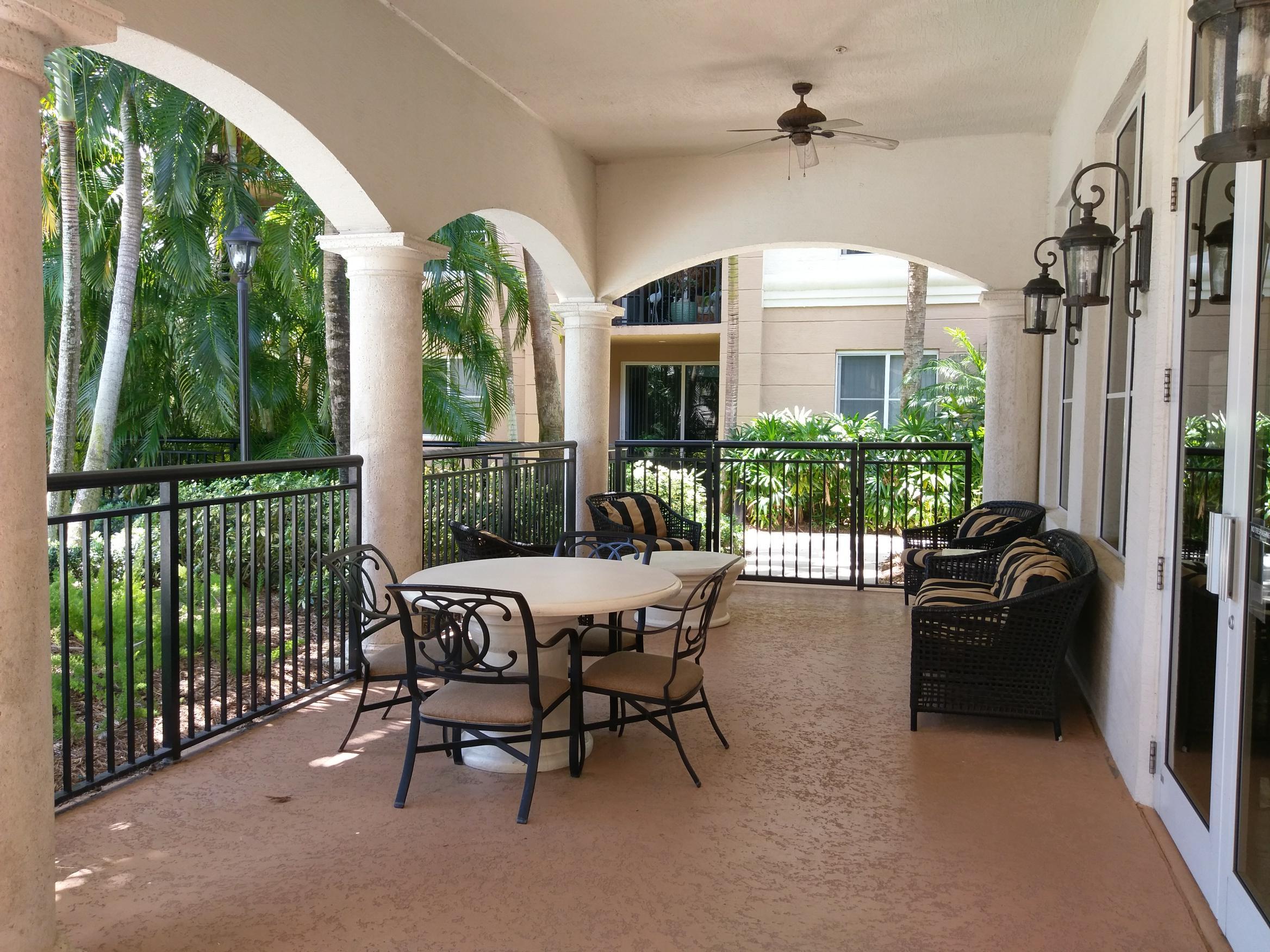 1690 Renaissance Commons Boulevard, Unit 1315 Boynton Beach, FL 33426 - Photo 25 of 39 Clubhouse - patio