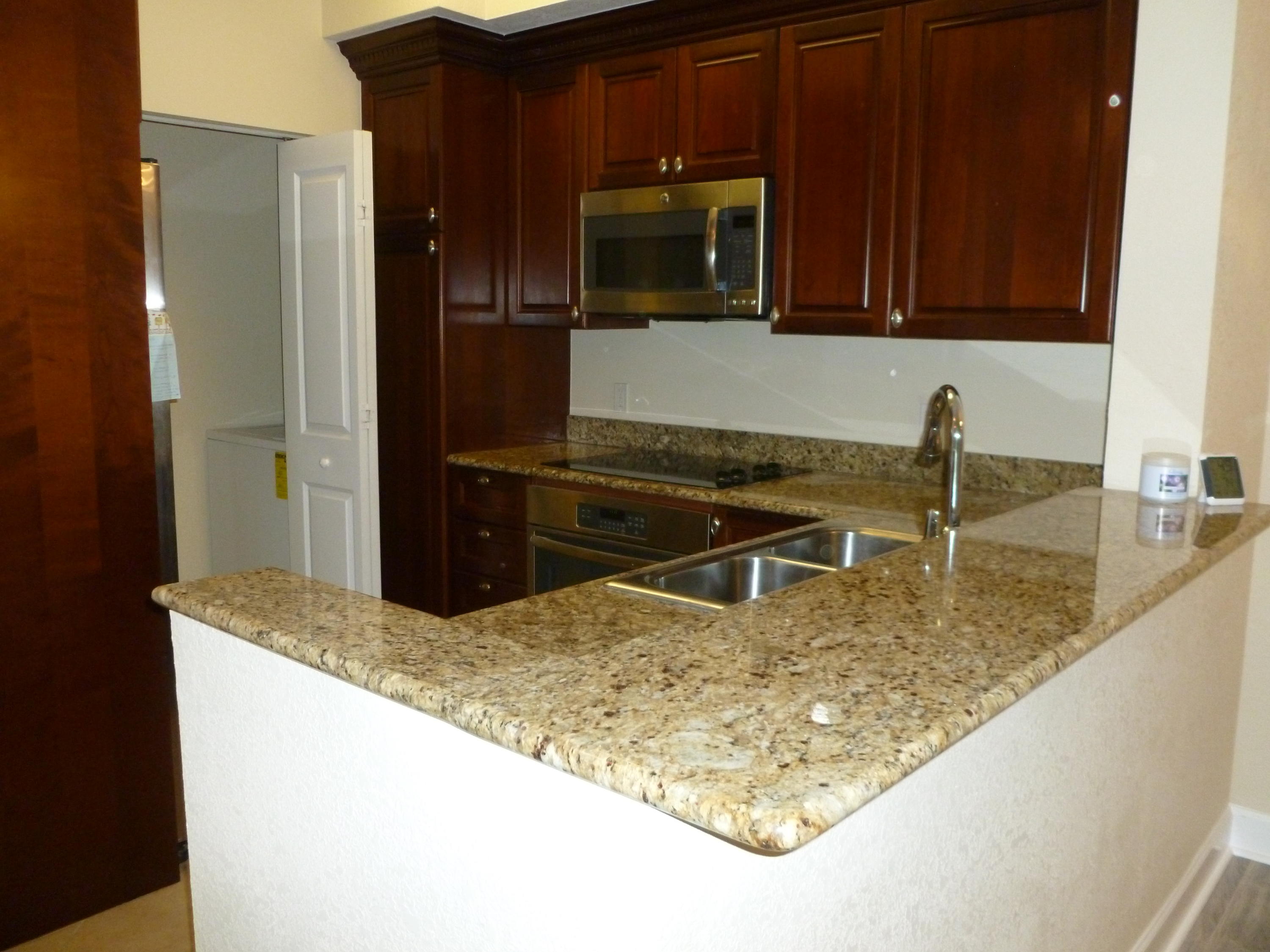 1690 Renaissance Commons Boulevard, Unit 1315 Boynton Beach, FL 33426 - Photo 5 of 39 Kitchen