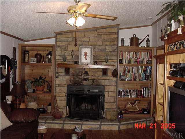 5500 Chestnut Road Molino, FL 32577 - Photo 5 of 10 Living Room Fireplace