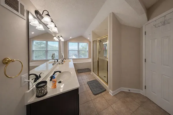 a bathroom with a sink and toilet