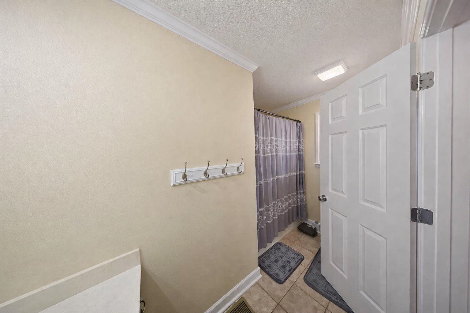 30 Point Grand Court Savannah, TN 38372 - Photo 16 of 40 a bathroom with a sink and toilet