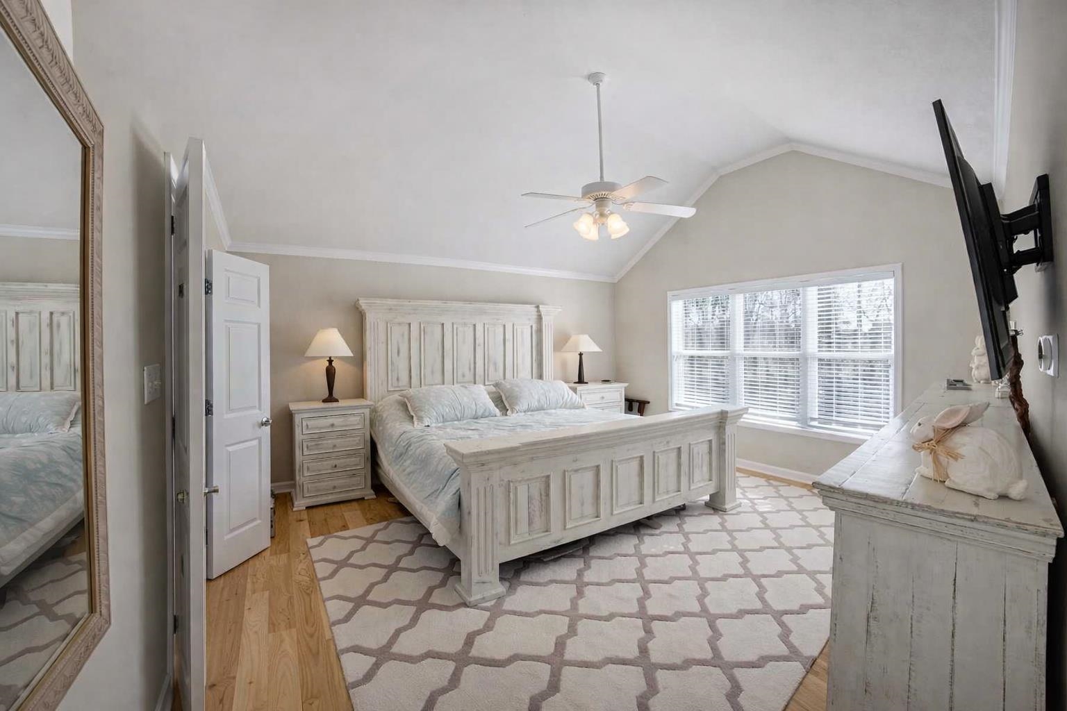 30 Point Grand Court Savannah, TN 38372 - Photo 33 of 40 a room with a bed and a large window