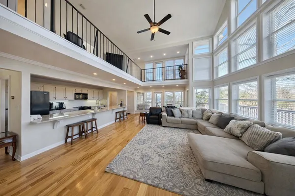 a bathroom with a sink mirror and vanity