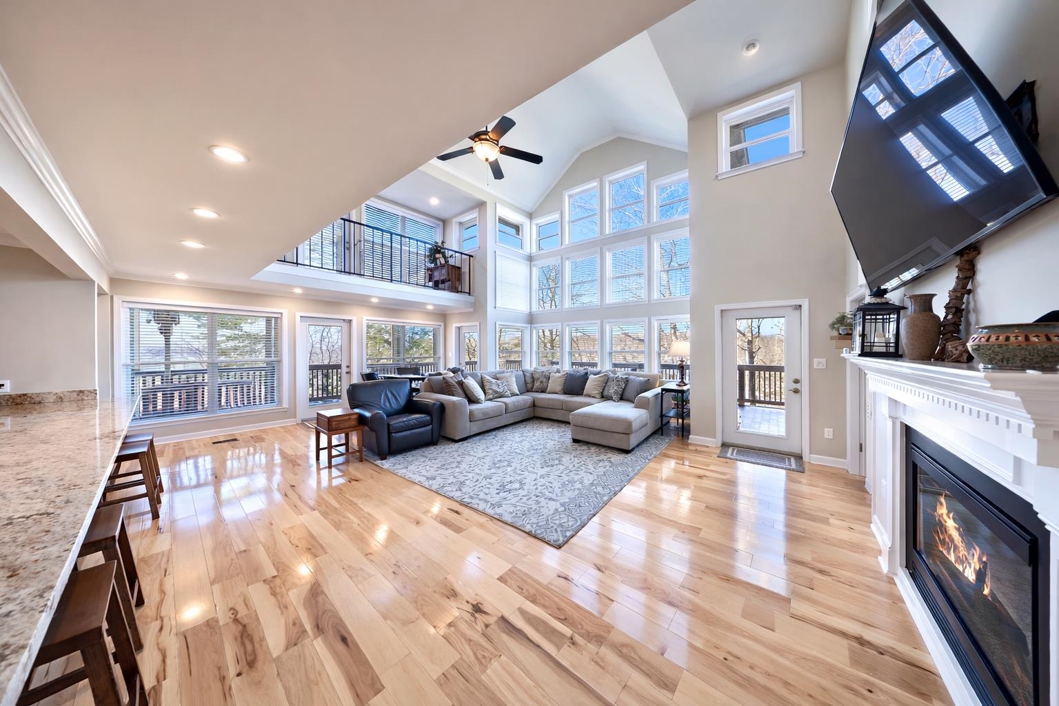 30 Point Grand Court Savannah, TN 38372 - Photo 8 of 40 a living room with furniture and a fireplace