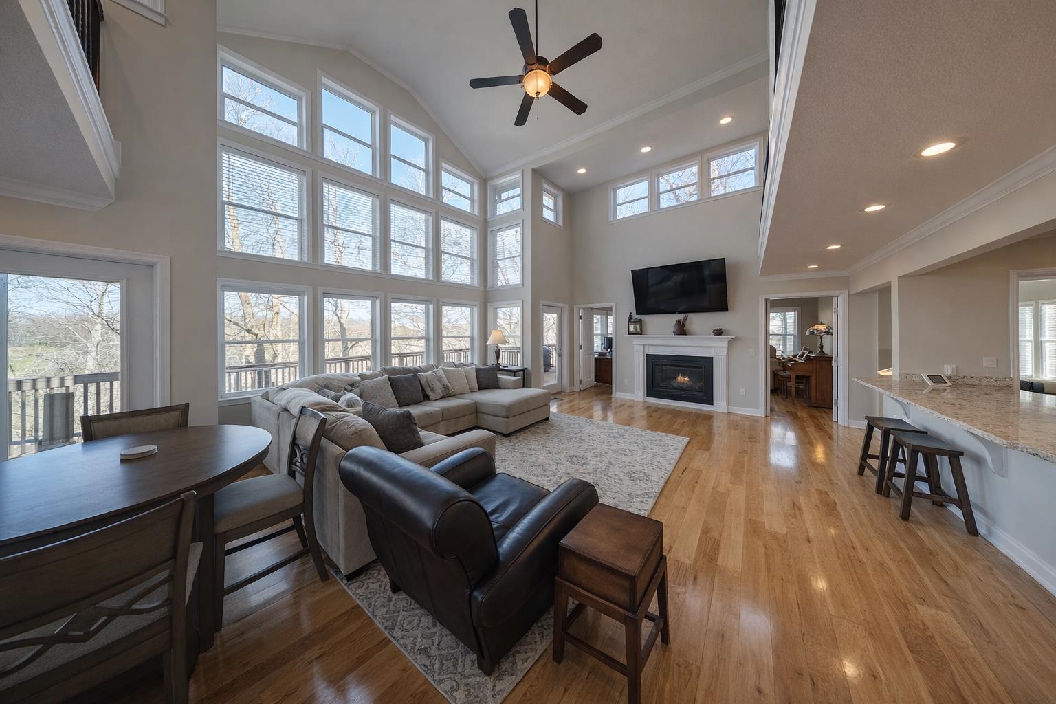 30 Point Grand Court Savannah, TN 38372 - Photo 9 of 40 a living room with fireplace furniture and a wooden floor