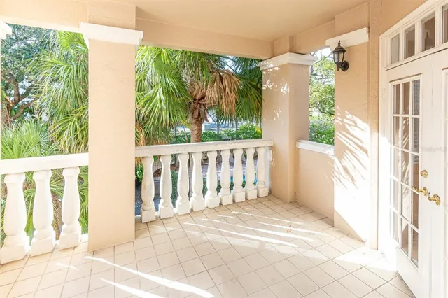 a view of a house with wooden floor and fence