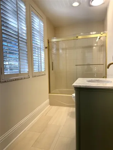 a bathroom with a sink and a bathtub