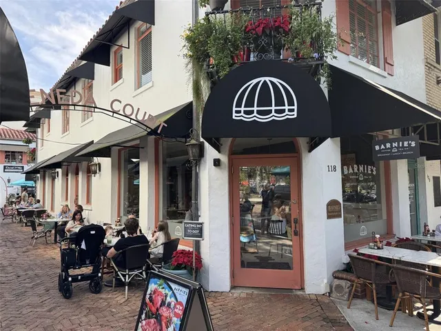 a front view of a building with outdoor space