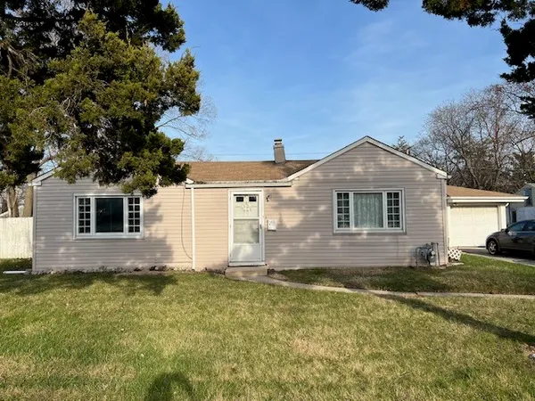 a front view of house with yard