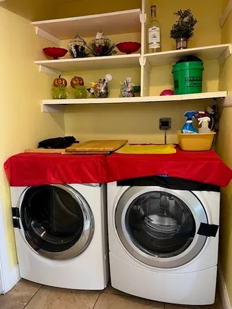 a utility room with dryer and washer