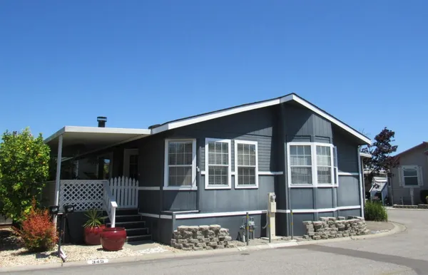a front view of a house with a garage