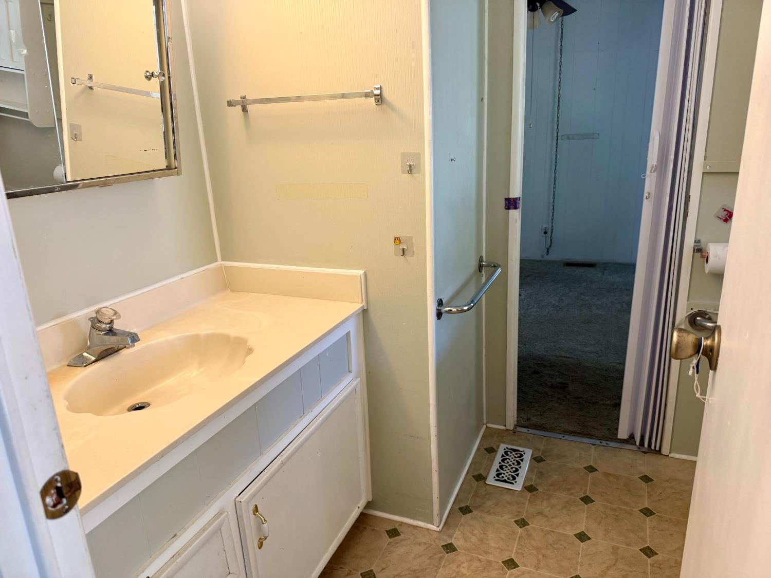 2958 Spring View Lane Placerville, CA 95667 - Photo 16 of 23 a bathroom with a sink and a mirror