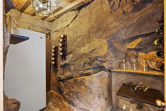 a room with gym equipment and mirror