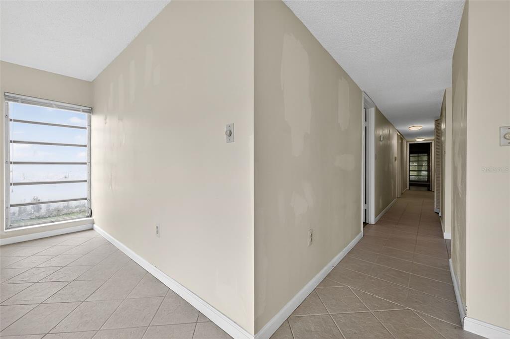 11530 Southwest 83rd Terrace Miami, FL 33173 - Photo 30 of 33 a view of a hallway with closet and stairs