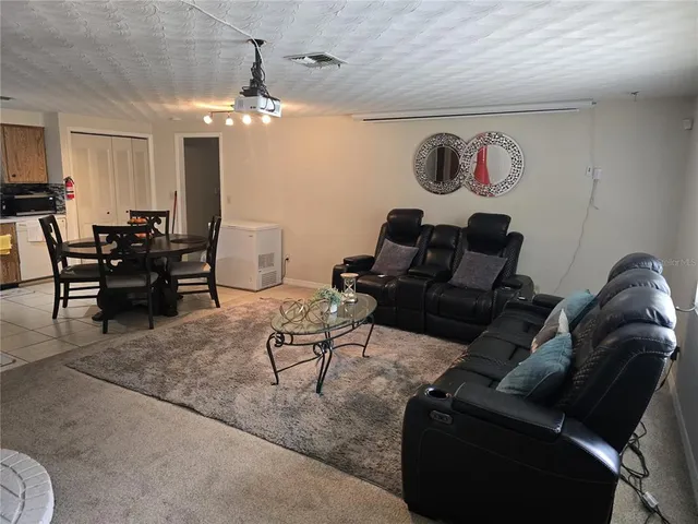 a view of a workspace with furniture