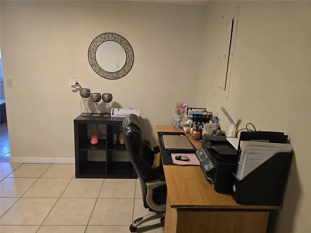 a view of a workspace with furniture