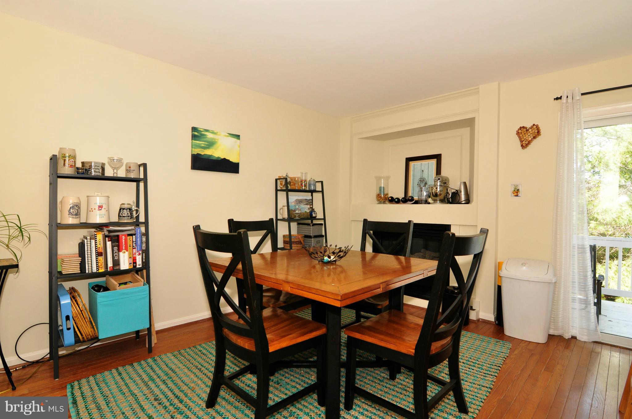 12095 Edgemere Circle Reston, VA 20190 - Photo 11 of 28 a dining room with furniture and wooden floor