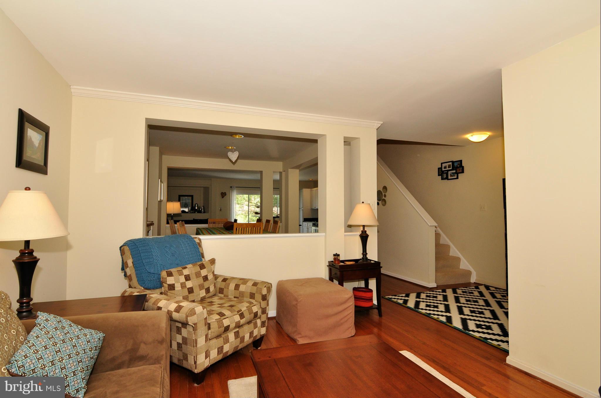 12095 Edgemere Circle Reston, VA 20190 - Photo 18 of 28 a living room with furniture and wooden floor
