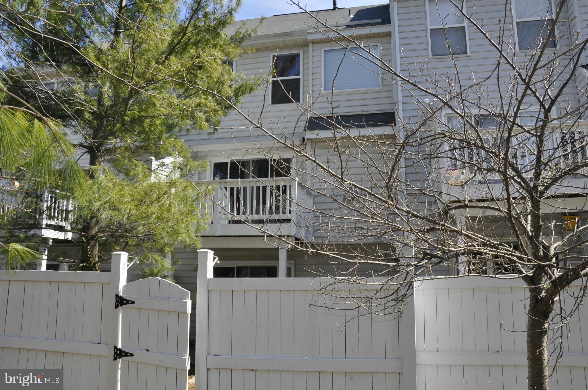 12095 Edgemere Circle Reston, VA 20190 - Photo 6 of 28 a house view with a tree in front of it
