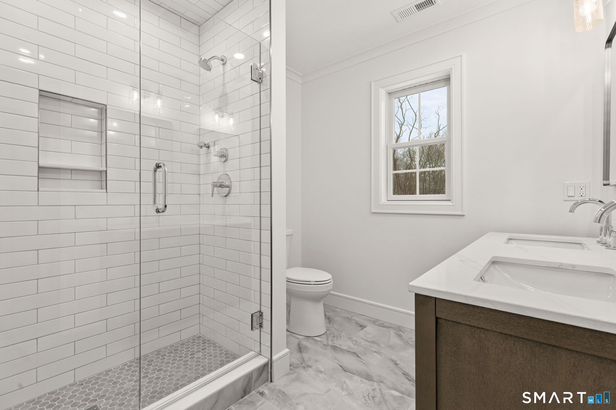 210 Pansy Road Fairfield, CT 06824 - Photo 23 of 26 a bathroom with a sink a toilet and shower