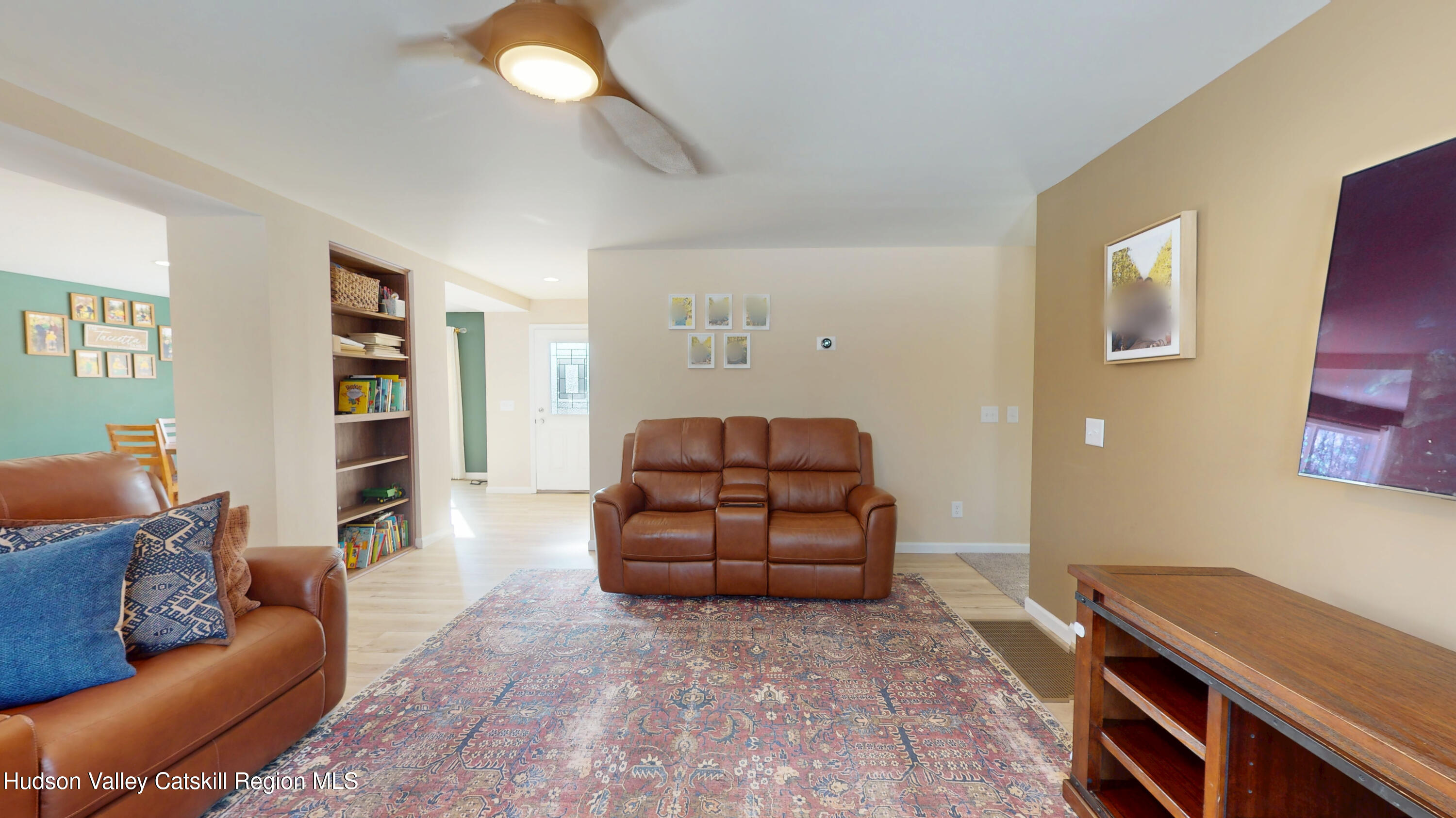 1608 Sleepy Hollow Road Athens, NY 12015 - Photo 13 of 46 a living room with furniture and a flat screen tv