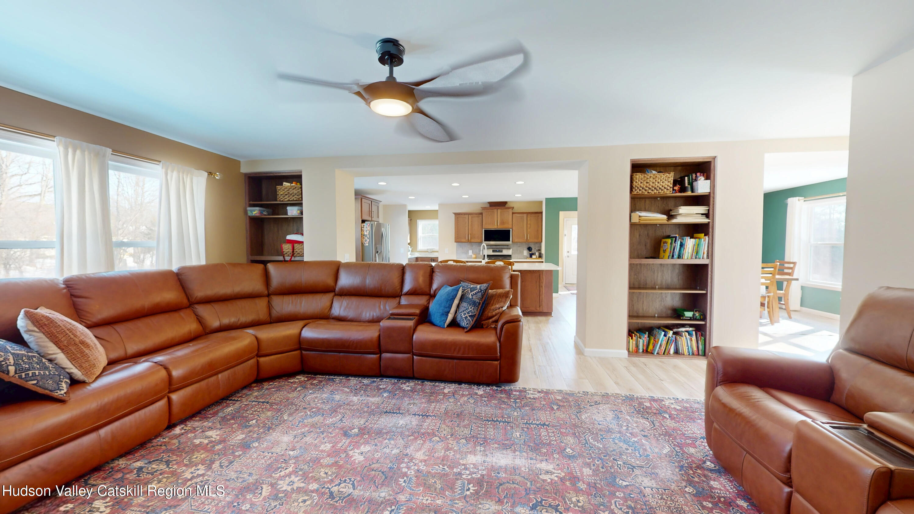 1608 Sleepy Hollow Road Athens, NY 12015 - Photo 14 of 46 a living room with furniture ceiling fan and a window