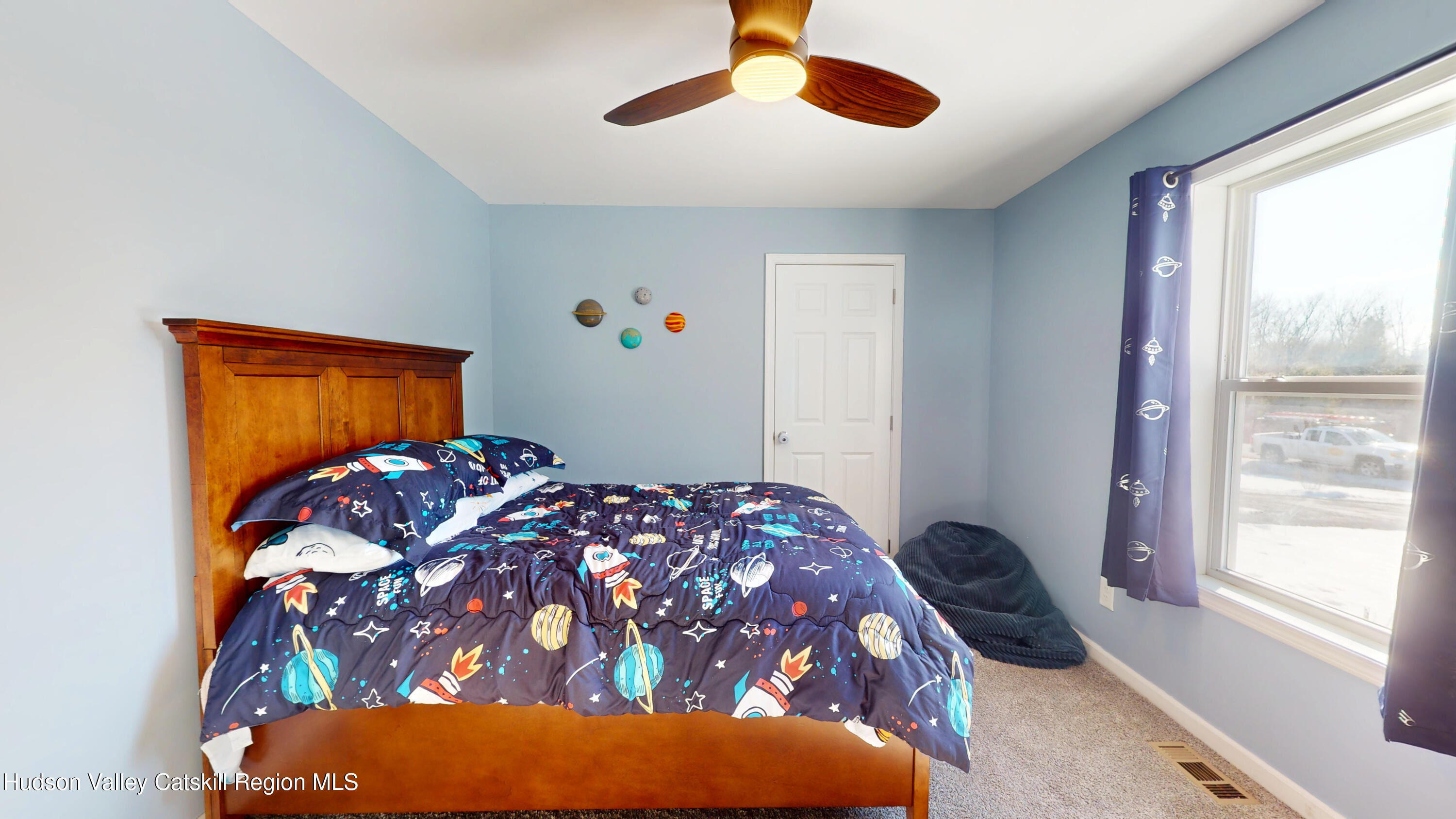 1608 Sleepy Hollow Road Athens, NY 12015 - Photo 16 of 46 a bedroom with a bed and a window