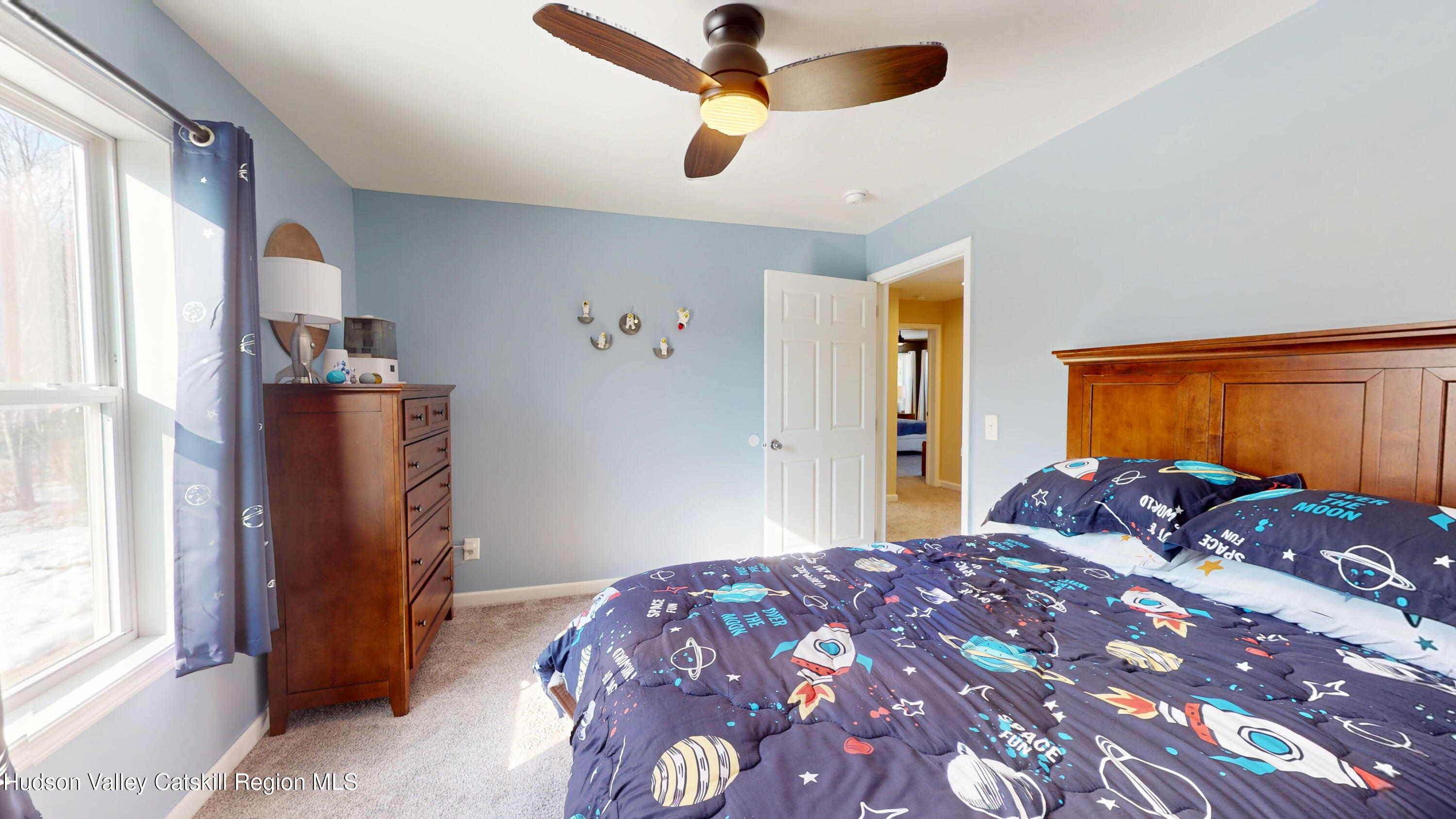 1608 Sleepy Hollow Road Athens, NY 12015 - Photo 17 of 46 a bedroom with a bed and a window