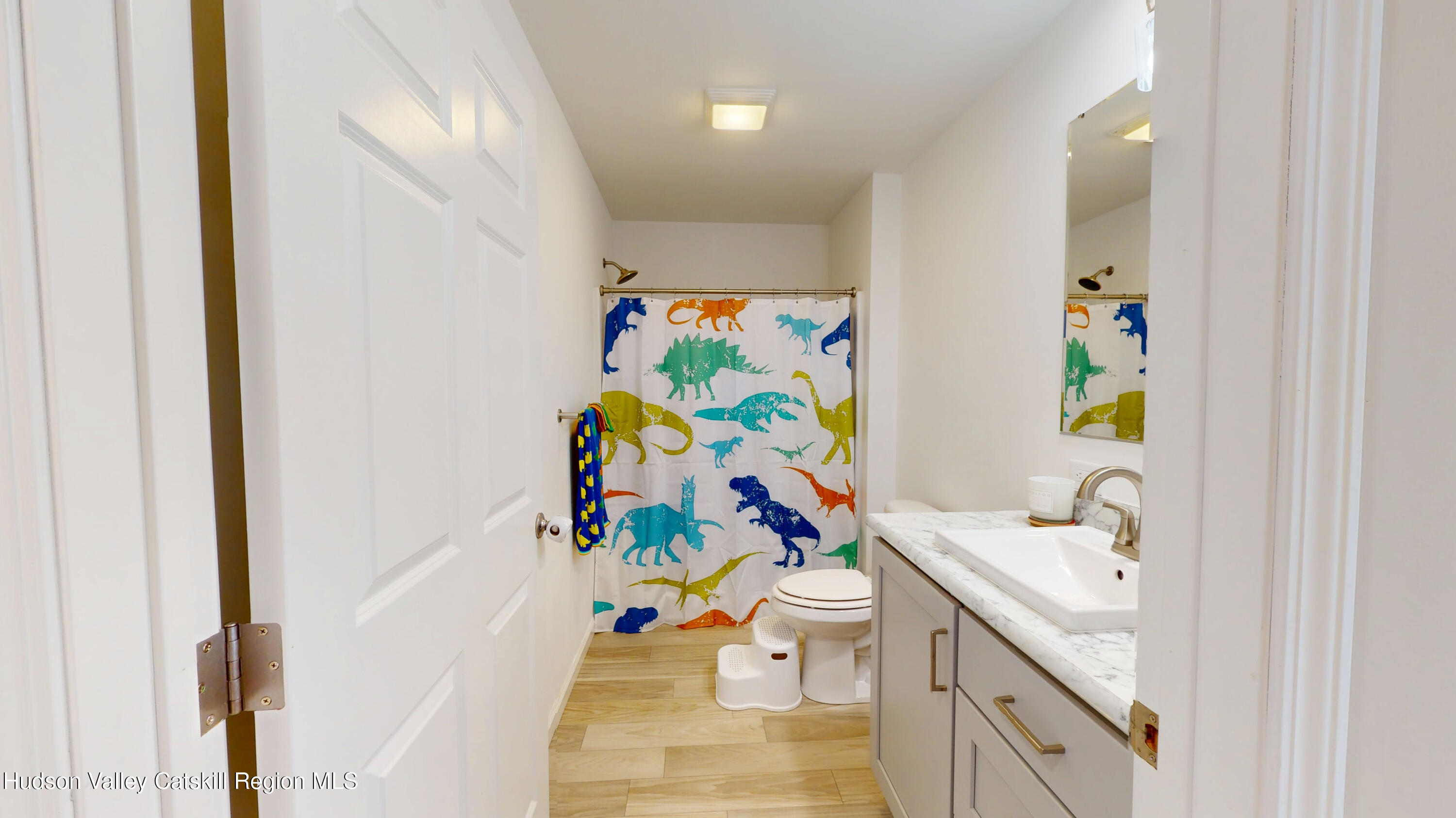 1608 Sleepy Hollow Road Athens, NY 12015 - Photo 18 of 46 a bathroom with a sink mirror and vanity