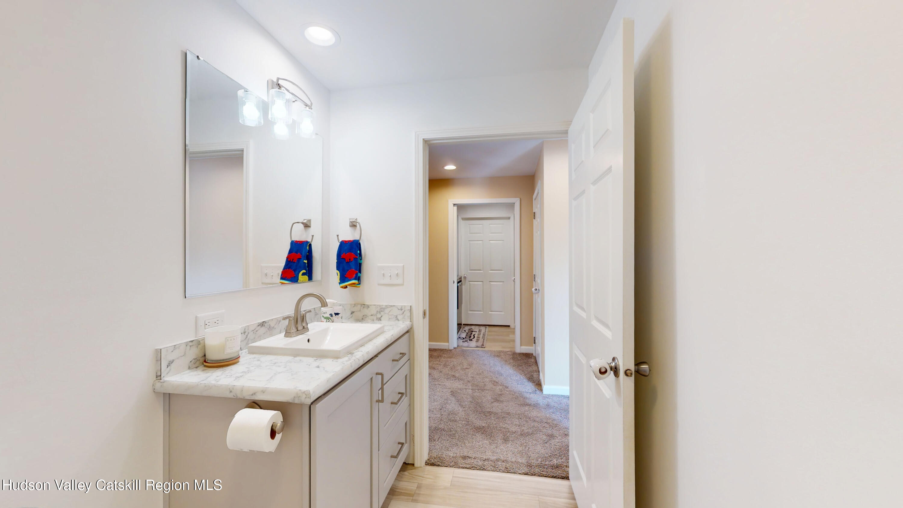 1608 Sleepy Hollow Road Athens, NY 12015 - Photo 19 of 46 a bathroom with a sink and a mirror
