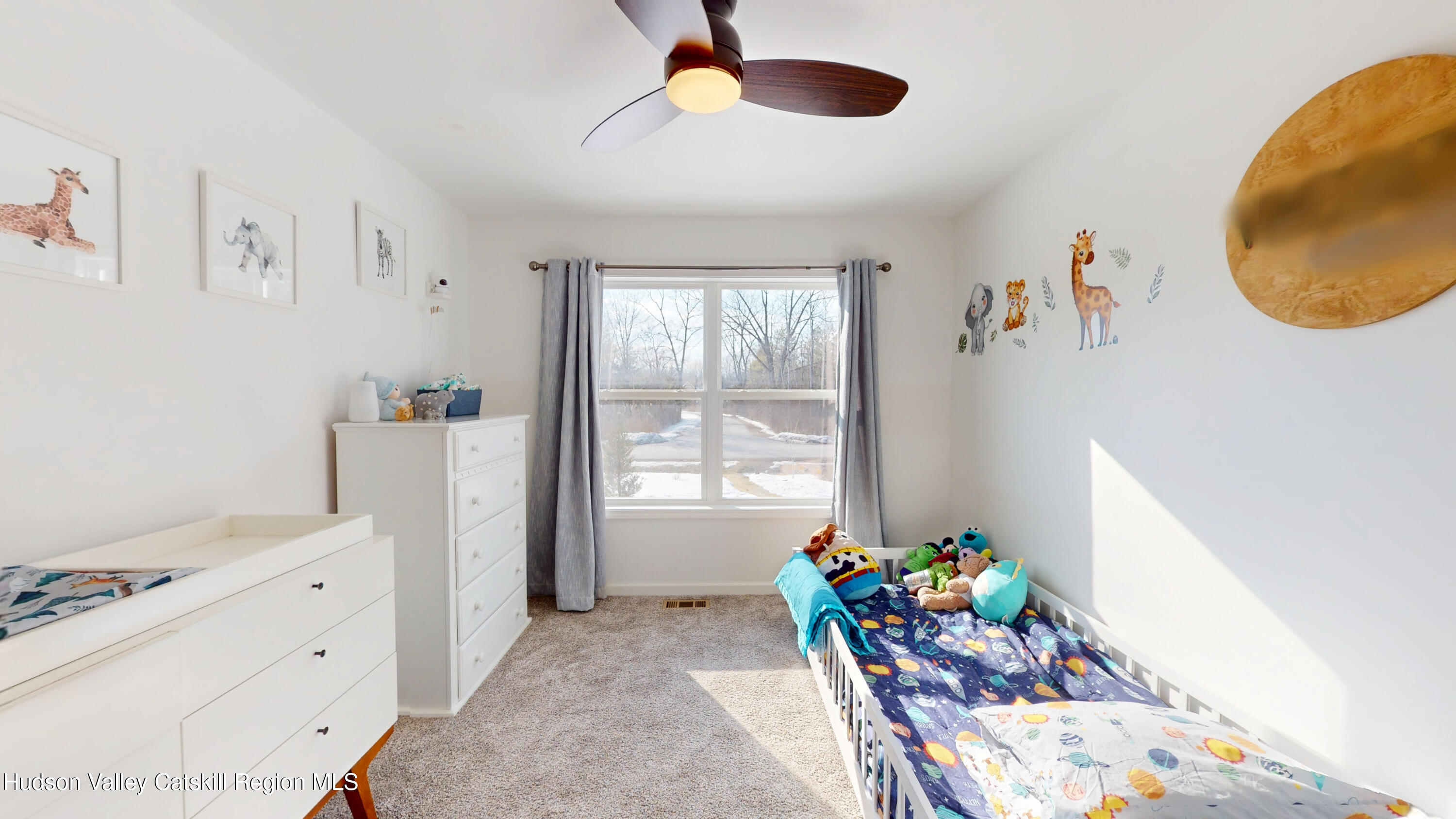 1608 Sleepy Hollow Road Athens, NY 12015 - Photo 20 of 46 a bedroom with furniture and a chair