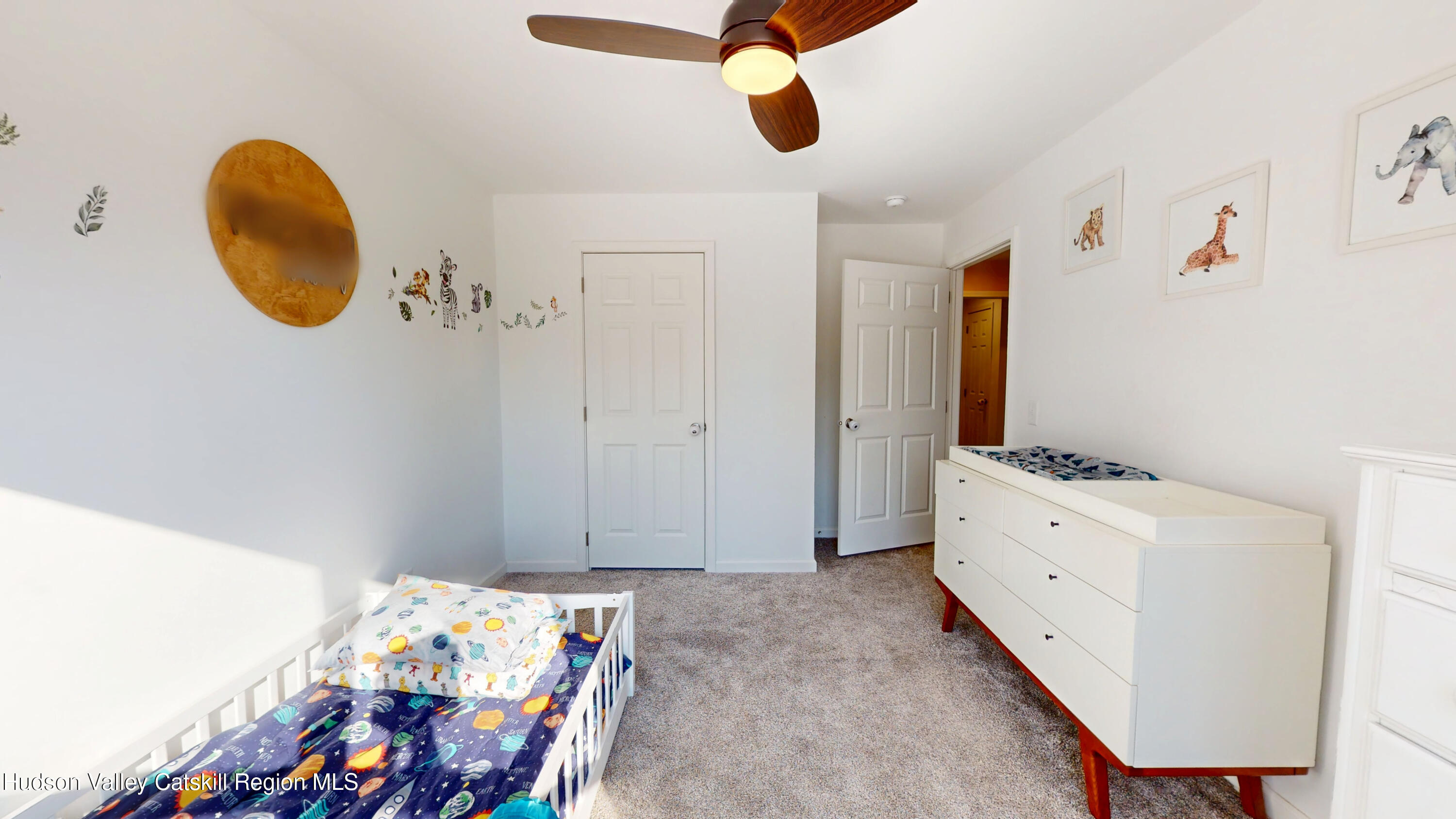 1608 Sleepy Hollow Road Athens, NY 12015 - Photo 21 of 46 a bedroom with a bed and cabinets