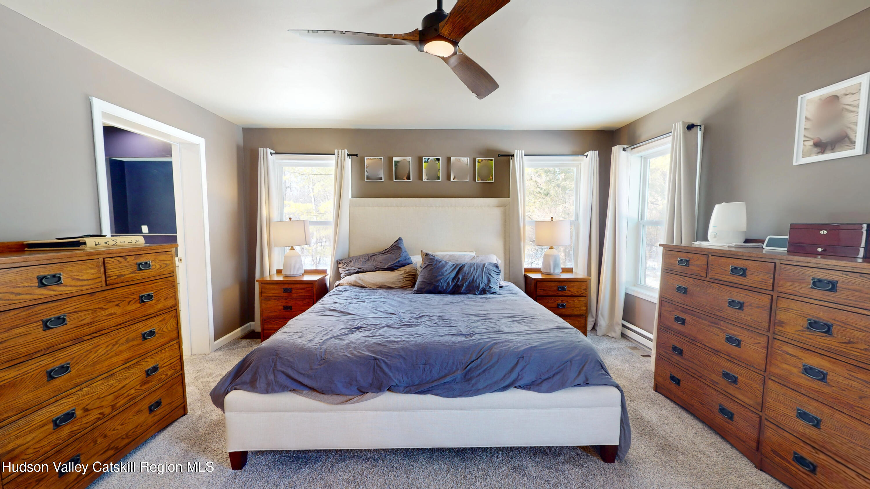 1608 Sleepy Hollow Road Athens, NY 12015 - Photo 23 of 46 a bedroom with a bed and a dresser