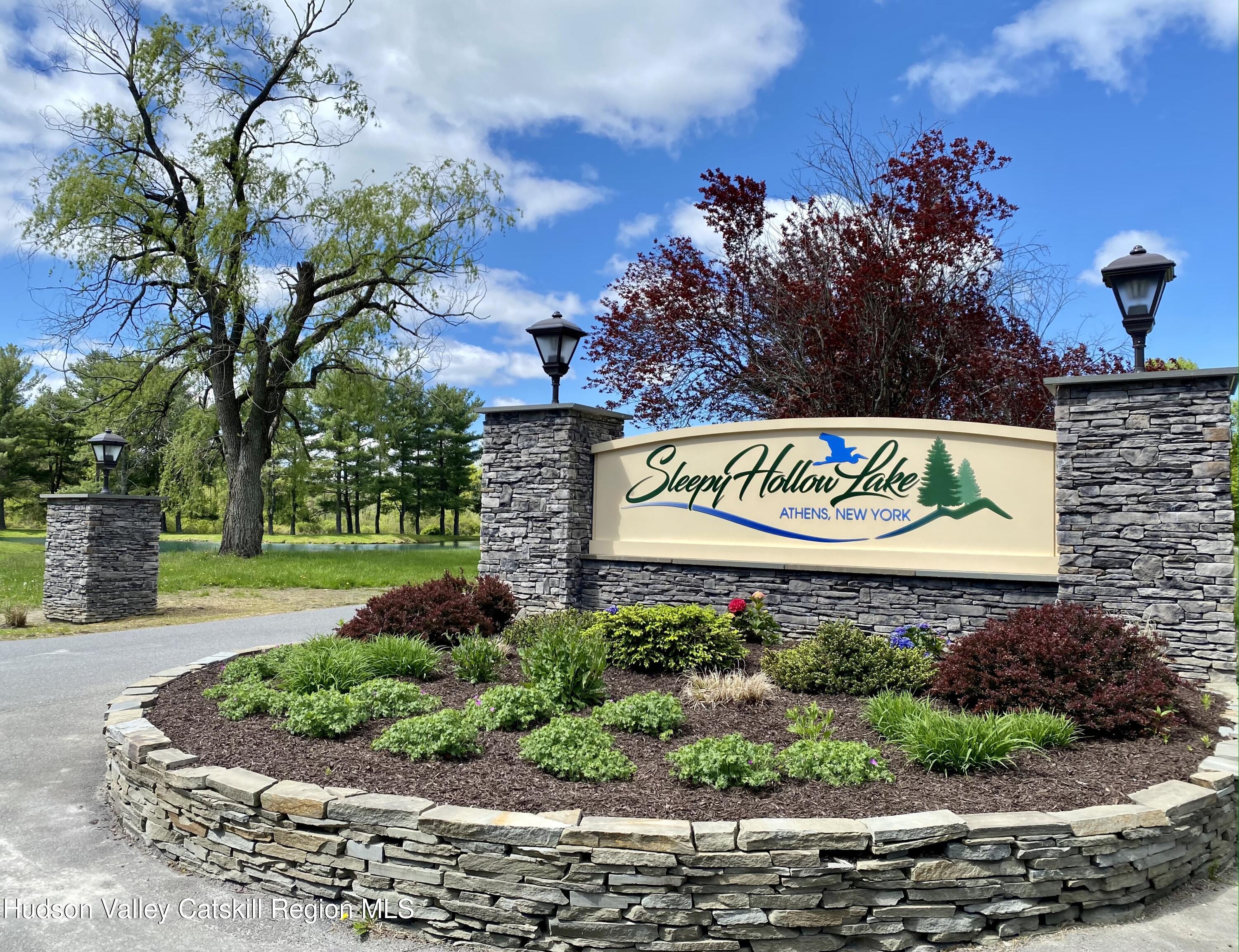 1608 Sleepy Hollow Road Athens, NY 12015 - Photo 45 of 46 a sign on the side of a building