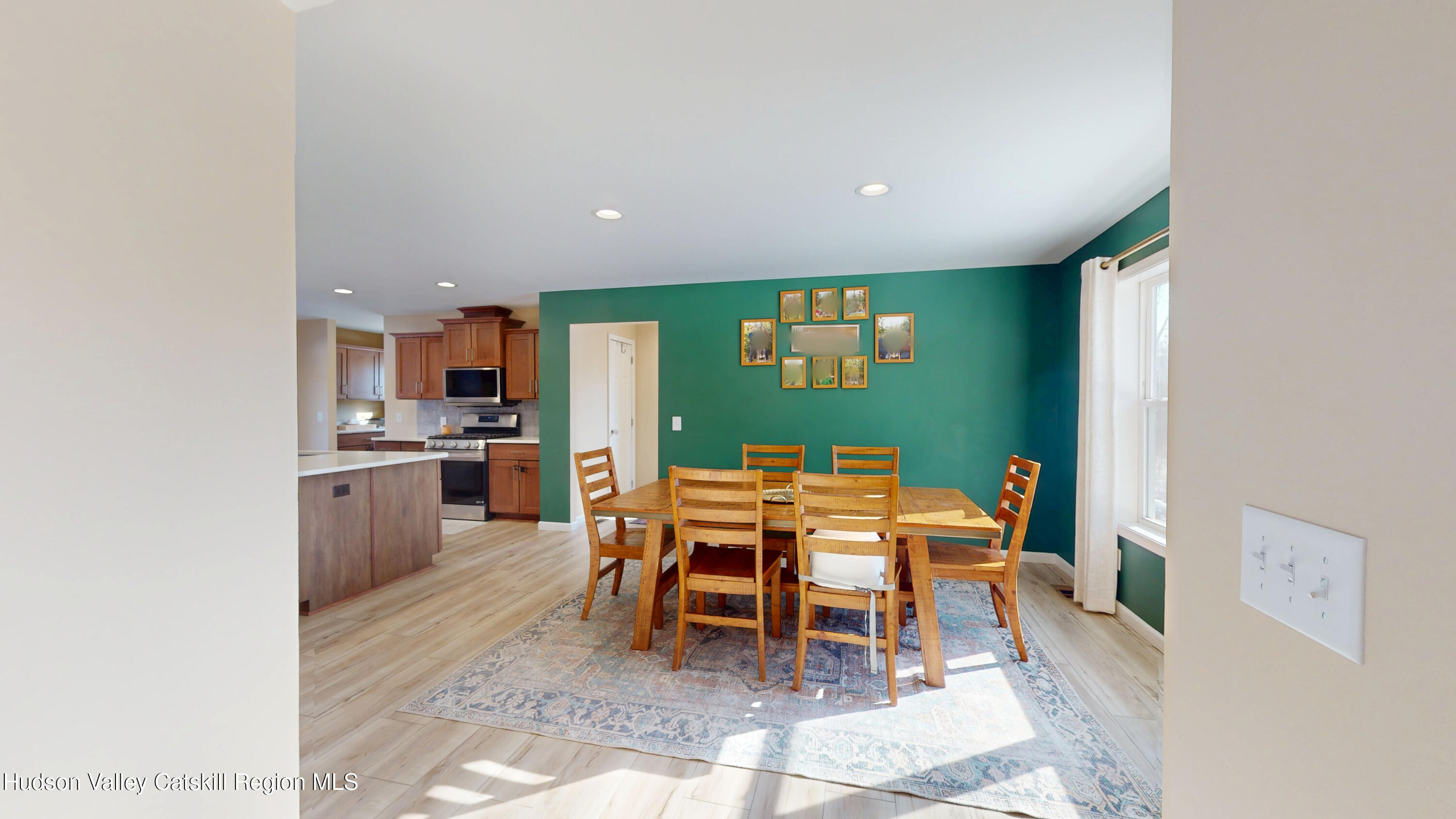 1608 Sleepy Hollow Road Athens, NY 12015 - Photo 9 of 46 a dining room with a table and chairs