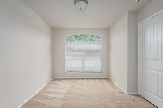 a bathroom with a double vanity sink and mirror